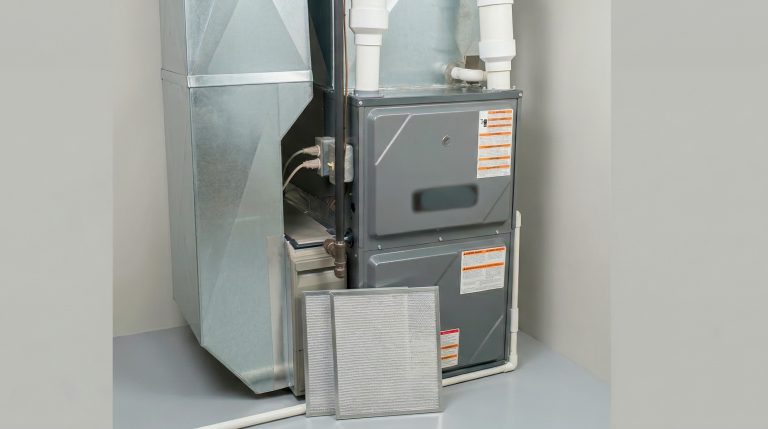filters against a furnace waiting to be installed