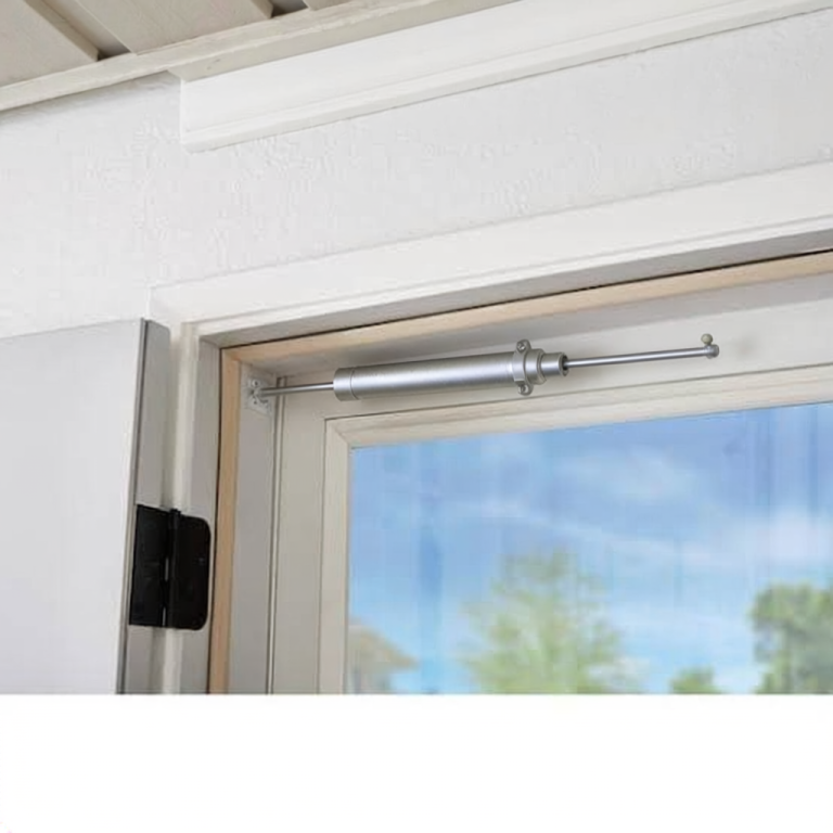 Silver pneumatic storm-door closer mounted between a partly open white storm door and its frame.